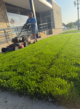 Commercial lawn mowing in downtown Clear Lake